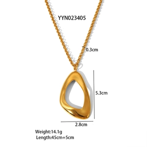 Gold stainless steel heart pendant necklace with organic hollow shape on white background