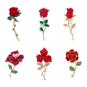 Detailed set of six rose brooches with red enamel, gold finish, rhinestones and pearls