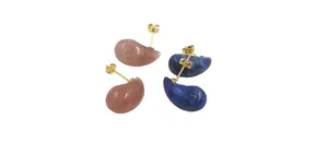 Macro shot of natural teardrop earrings featuring polished rose quartz and lapis lazuli stones