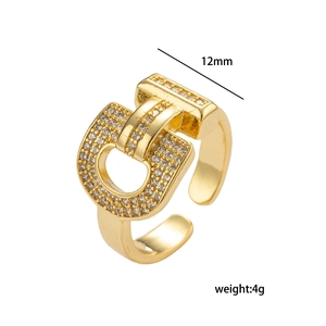 Gold horseshoe buckle ring with micro-pave zircons and 12mm open adjustable band