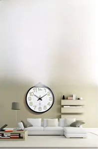 Close-up of a 12-inch wall clock featuring large luminous numbers and quartz movement