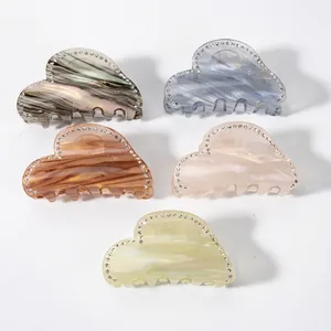 Elegant 8cm heart-shaped acetate hair claws with marble texture and rhinestones