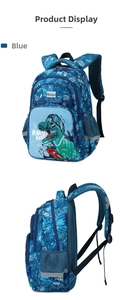 Detail view of durable navy blue shark backpack featuring dinosaur prints and reflective straps