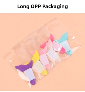Close-up of colorful fishtail makeup tools in long transparent OPP bag packaging