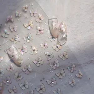 Macro detail of MS 572 aurora butterfly nail stickers with romantic crystal accents