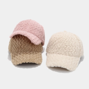 Winter plush baseball caps in pink, khaki, and beige colors with a soft textured finish
