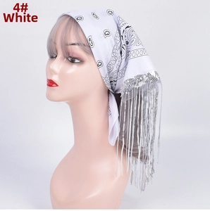 Detail of white paisley bandana with silver fringe tassels on a mannequin head