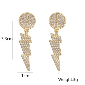Detailed view of 18K gold plated lightning bolt earrings with zircon dimensions 3.3x1cm