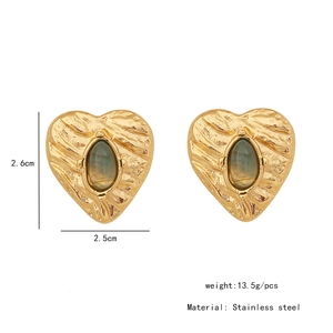 Detailed view of vintage gold heart earrings with grey stone including size 2.6cm specs
