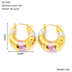 Detailed view of tricolor gold plated 18k stainless steel earrings with size specs