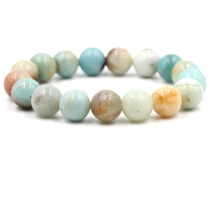Fashionable elastic stretch bracelet with colorful natural stone beads on a white background