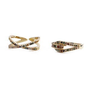 Detail of adjustable gold-plated geometric rings with multi-color zircon stones