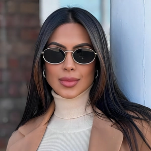 Retro oval sunglasses with slim silver metal frame and dark black lenses for men and women