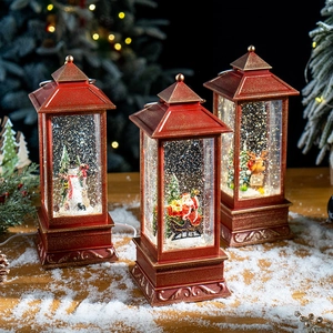 Vintage red Christmas glitter lanterns with Santa, Snowman, and Reindeer motifs