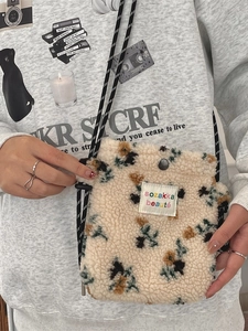 Cute cream plush flower shoulder bag made of soft faux shearling with floral patterns