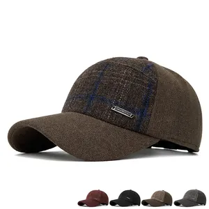 Winter plaid earflap baseball cap in brown fleece with warm lining and metal emblem