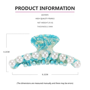 Blue marble shell hair claw with pearls showing 9.2cm size and 29.5g weight specs