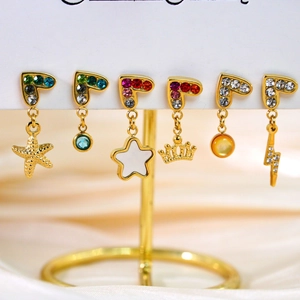 Golden stud earring set with colorful rhinestones in heart and star shapes