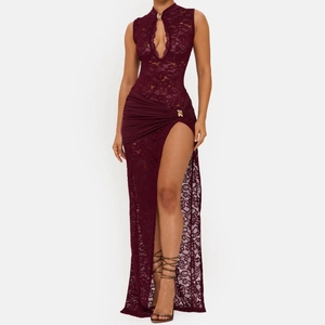 Detail of burgundy lace dress featuring hollow-out chest design and side slit