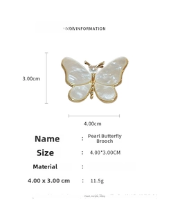 Détail de la broche papillon en perles avec dimensions 4x3cm et spécifications