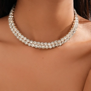 Close-up of double-row silver choker with sparkling rhinestones for elegant evening wear