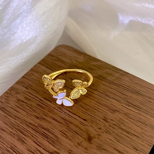 Three butterflies gold plated open ring with white enamel and sparkling zircon stones