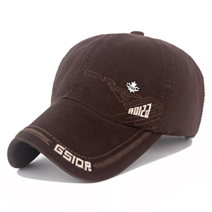 Detail of cotton baseball cap with white GSIOR embroidery and metal maple leaf badge