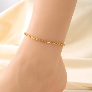 Detail of adjustable gold-plated stainless steel anklet with classic square box chain design