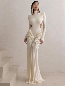 Elegant off-white fishtail evening gown with long sleeves and waist cut-out detail