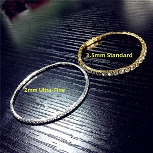 Detail view of 2.0mm and 3.5mm elastic rhinestone bracelets in gold and silver finishes