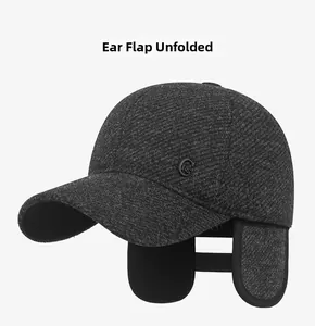 Detail of the men's winter baseball cap with unfolded ear flaps for cold protection