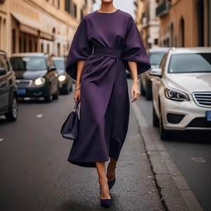 Elegant deep purple batwing sleeve maxi dress with cinched waist in urban street style