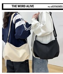 Close-up of black and cream pleated crossbody bags showing durable nylon texture