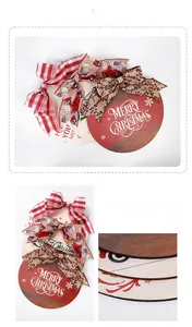 Macro detail of round wooden Christmas door signs with festive bows and Merry Christmas print