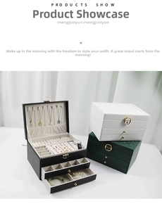 Multi-tier drawer jewelry box in black, white, and green with gold ring clasp and PU leather