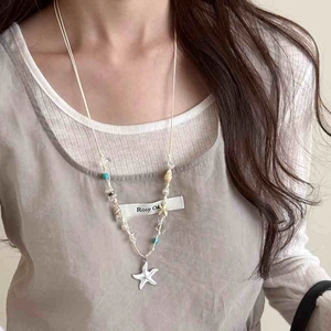 Starfish pendant necklace with white faux pearls and beads for a summer beach look
