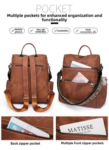 Detail view of brown vintage backpack showing multi-pocket storage and floral strap