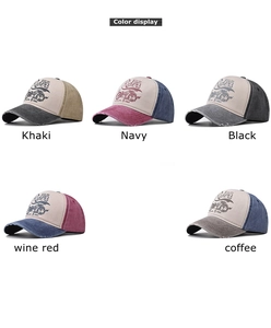 Multiple colors of washed cotton baseball caps with vintage Riders prints on white background