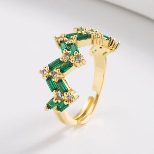 18K gold plated geometric wave ring with green and white zircons in a minimalist style