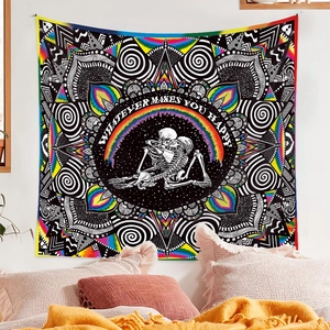 Detail of bohemian mandala tapestry featuring kissing skeletons and a colorful rainbow pattern
