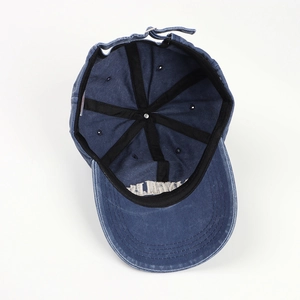 Washed dark blue baseball cap with internal six-panel construction and metal buckle