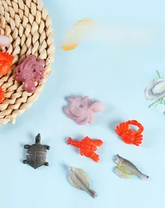 Macro detail of assorted colorful PVC seafood miniatures for DIY ocean landscape decor