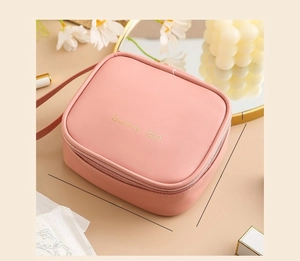 Pink PU sanitary napkin bag measuring 15x13x6cm with Sunny Girl text and handle