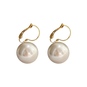 Classic 14K gold plated hoop earrings with large white resin pearls on white background