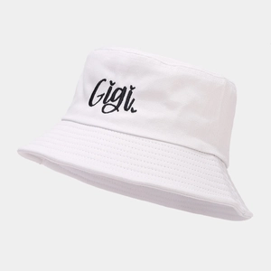 White canvas bucket hat with Gigi heart embroidery in a stylish minimalist casual design