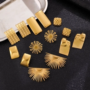 Collection of gold vintage geometric earrings with sunburst and quilted textures