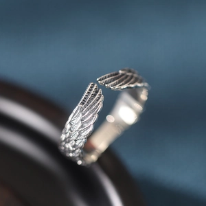 Adjustable sterling silver feather angel wing ring with vintage hip hop style design