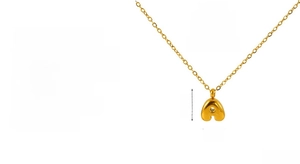 Detailed view of golden letter A bubble pendant with 18k gold plating on steel chain