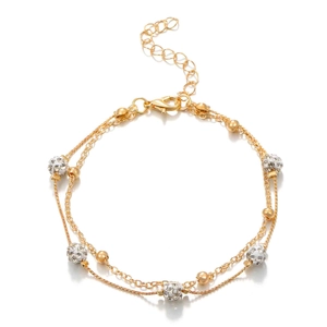 Double-layered gold anklet featuring crystal-encrusted Shamballa balls and metallic beads