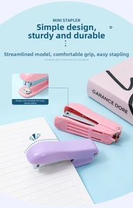 Mini stapler detail showing the streamlined body and staple indicator window design